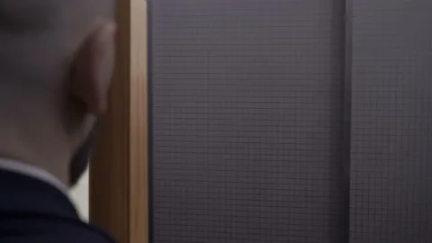 Businessman meeting visiting client at elevator hall. Video stock 133547537