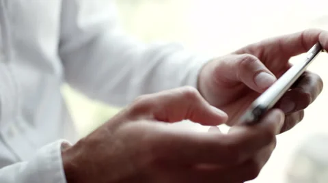 Businessman messaging on mobile. Stock Footage 64103637