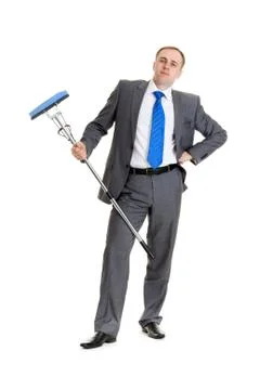Businessman with a mop Stock Photos