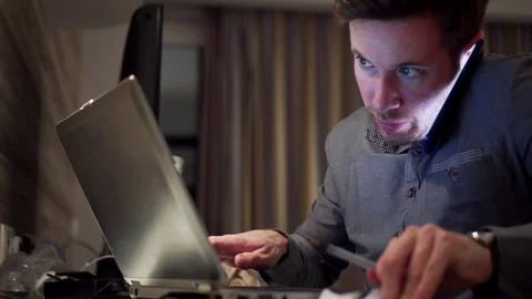 Businessman Multi Tasking At Work With Laptop And Mobile Phone Call, 4K Stock Footage 104267355