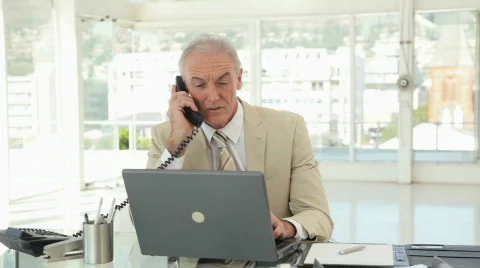 Businessman Multitasking at the Office Stock Footage 853552