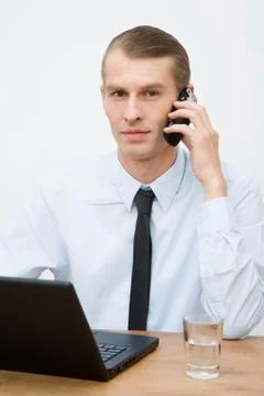 A businessman multitasking Stock Photos