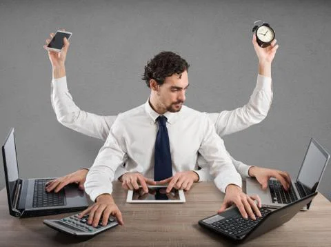 Businessman multitasking Stock Photos