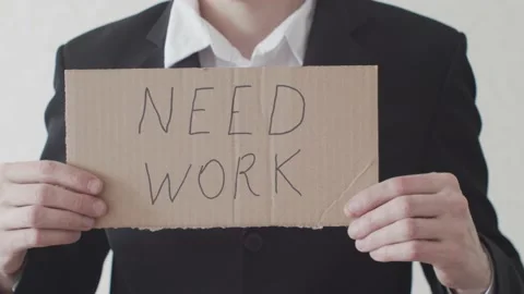 Businessman in Need of Work with Carton Note Stock Footage 176470786