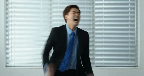 Businessman with a negative expression Stock Footage 100950486