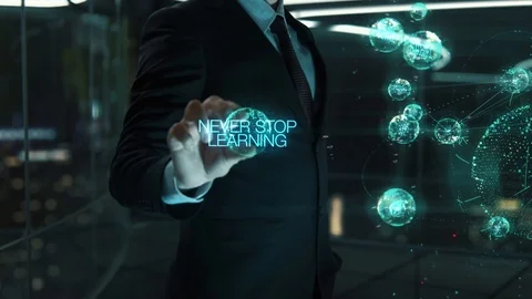 Businessman with Never Stop Learning hologram concept Video stock 120428366