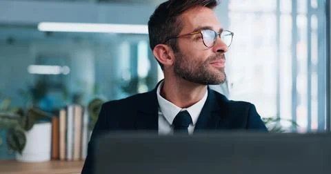Businessman, office and thinking by computer, smile and decision for career Stock Photos