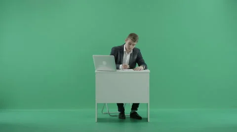 Businessman at the office Stock Footage 64785574