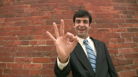 Businessman is a-ok! Stock Footage