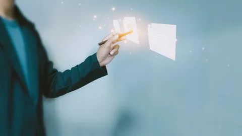 Businessman opening document on virtual screen ,Documents and data collecti.. Stock Photos