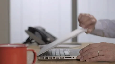 A businessman opening lap top computer, logging on to begin typing Stock Footage 68446867