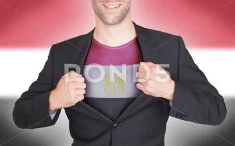 Businessman opening suit to reveal shirt with flag Stock Photos