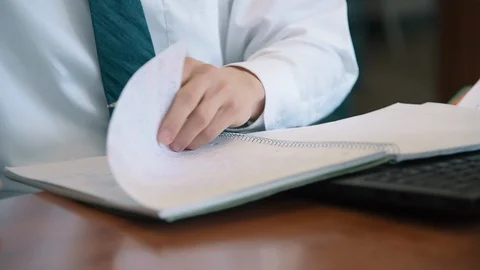 Businessman Opens Notebook Stock Footage 86880976