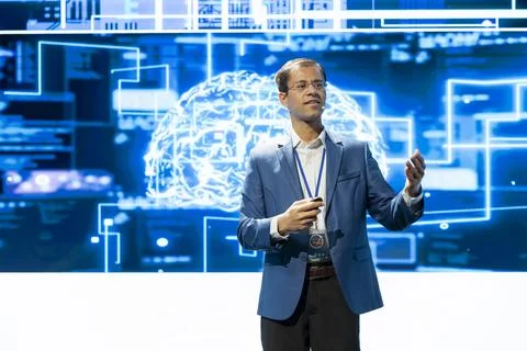 Businessman operates slide remote while presenting AI brain research Stock Photos