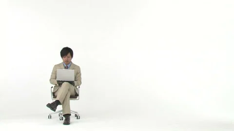 Businessman Operating a Computer Stock Footage 332764202