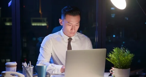 Businessman overtime work Stock Footage 110800506