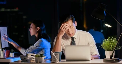 Businessman overtime work Stock Footage 115775817