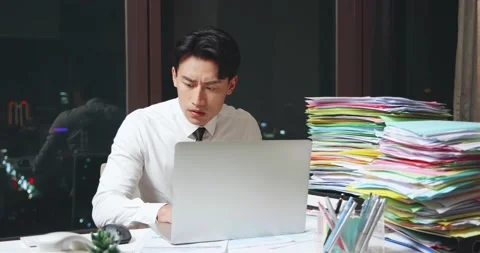 Businessman overwork at office Stock Footage 150988209