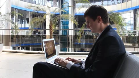 Businessman with personal computer Stock Footage