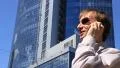 Businessman with phone HD Footage