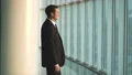 The businessman phones in the office hall. slow motion 4k or 4k+ Resolution