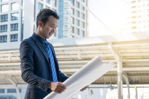 Businessman planning construction project Stock Photos