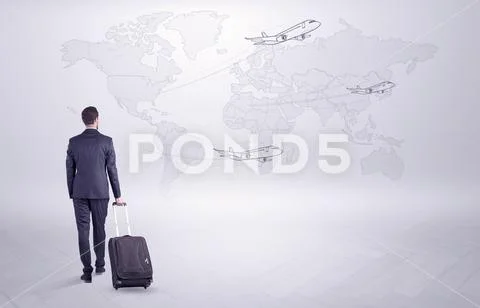 Businessman planning his trip over the world Stock Photos