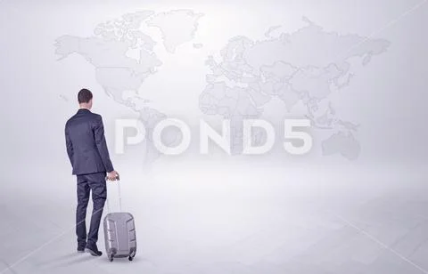 Businessman planning his trip over the world Stock Photos