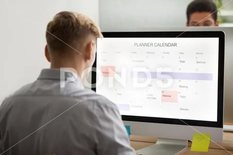 Businessman planning making schedule on computer planner applica Stock Photos