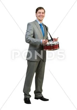 Businessman playing drums Stock Photos