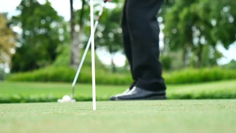 Businessman playing Golf ball practice hit swing on tee in golf club Video stock 273462429