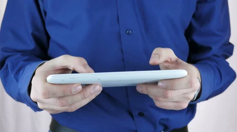 Businessman Playing On Tablet Stock Footage 64051568