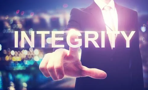 Businessman pointing at INTEGRITY Foto stock