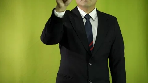 Businessman pointing with one hand at something in front, touching the screen Video stock 275348461