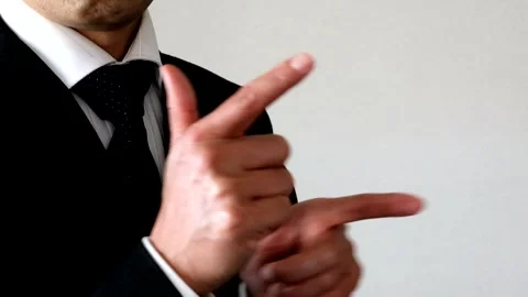 A businessman pointing to the side Stock Footage 335496915
