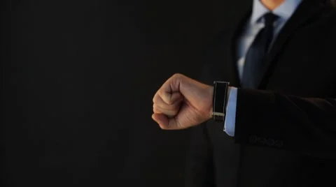 Businessman pointing to smart watch on his hand Stock Footage