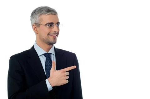 Businessman pointing at something Stock Photos