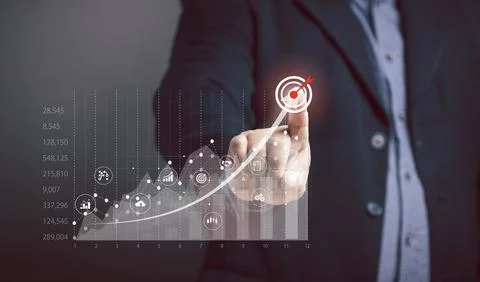 Businessman points target at graph on virtual screen, business growth, maxi.. Stock Photos