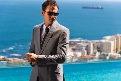Businessman by the pool Stock Photos