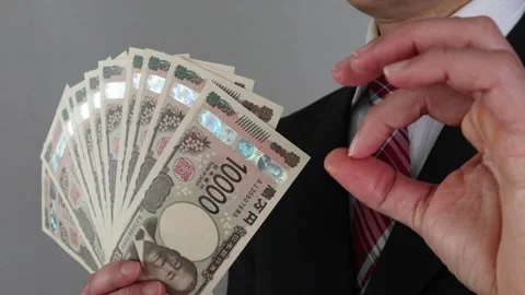 Businessman posing with banknotes Stock Footage 325692041