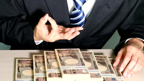 A businessman posing in front of a large sum of money. Stock Footage 334765504