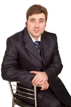 Businessman posing in a suit Stock Photos