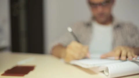 Businessman pouring and drinking beer in office after hard work.b Stock Footage