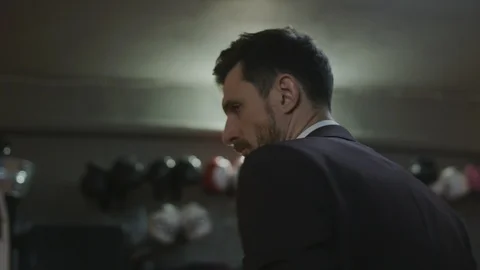 Businessman preparing for a fight Stock Footage 106932091