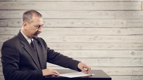 The businessman is preparing to sign the document Stock Footage 105740702