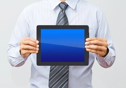 Businessman present blank empty tablet Stock Photos