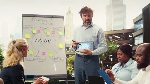 Businessman presenter showing tablet with artificial intelligence system Stock Footage 338380540
