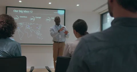 Businessman Presenting at Conference using Projector Stock Footage 241864983