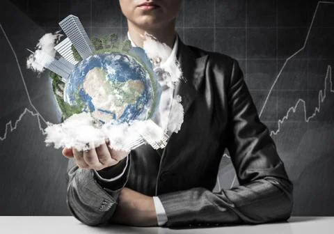 Businessman presenting Earth globe. Stock Photos