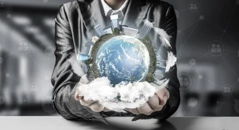 Businessman presenting Earth globe. Stock Photos